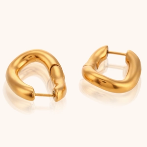 Macro view of 18K gold plated stainless steel chunky hoop earrings with U-shaped design