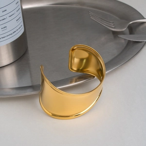 Minimalist wide wave open cuff bangle in 18K gold plated polished stainless steel