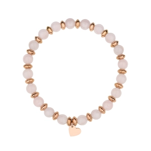 Macro detail of a pink stone bead bracelet with rose gold spacers and a heart charm