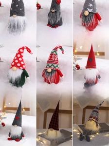 Detail grid of Christmas gnome plush ornaments with LED lights and varied patterns
