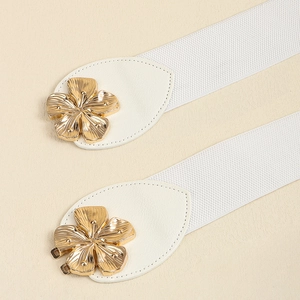 Women's white elastic corset belt featuring gold peach blossom metal buckle detail