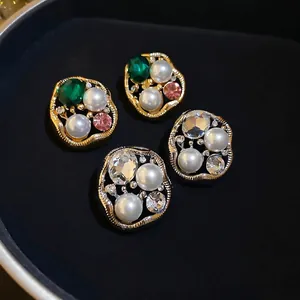 Vintage irregular oval pearl stud earrings with zircon and emerald crystal accents