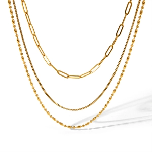 Three-layer gold stainless steel necklace featuring paperclip, snake, and beaded chains