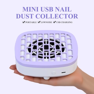 Macro view of portable mini USB nail dust collector with purple grill held in hand