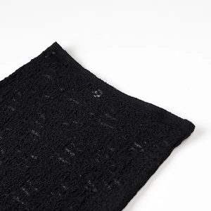 Jupe sexy en dentelle noire avec ourlet asymétrique et coupe sirène ajustée pour femme