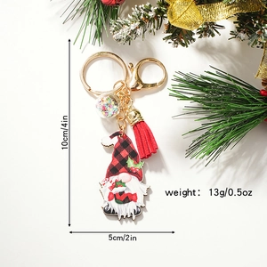 Christmas gnome keychain with red plaid hat, colorful star glass ball and tassel