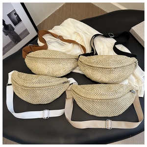 Straw waist bags in four colors with adjustable straps for summer beach vacation style