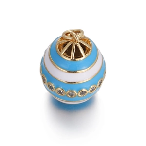 Macro view of evil eye charm bead with blue enamel and sparkling cubic zirconia stones