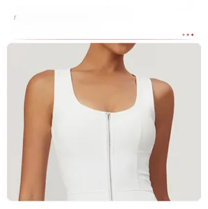 Close-up of white sports bra with front zipper and supportive 3D contour stitching