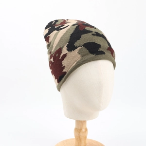 Detail of winter knit beanie showing classic camouflage pattern and elastic fabric texture
