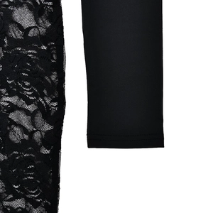 Detailed view of floral lace splicing on black slim-fit bodycon jumpsuit