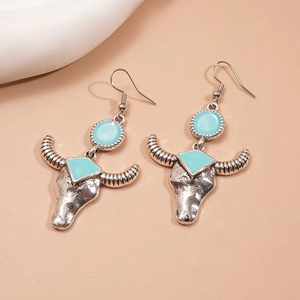Retro bull head earrings in vintage silver with blue turquoise for a bohemian style