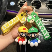 Dettaglio di portachiavi in silicone Mario e Luigi con cinturini Story e ciondoli a fungo