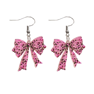 Detail of leopard print bow earrings in pink acrylic with silver hook for women