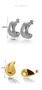 Detail view of silver C-shaped and golden teardrop earrings with precise dimensions