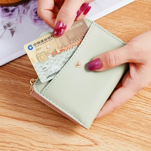Green minimalist PU leather wallet for women showing card slots and snap button