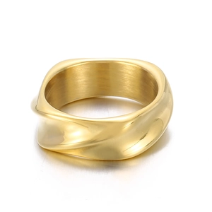 Polished gold irregular twisted geometric stainless steel ring with a wide wavy design