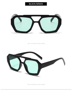 Detail of geometric double-bridge sunglasses with black frames and mint green lenses