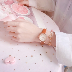 Rose gold watch with cat ears and matching celestial heart charm bracelet set