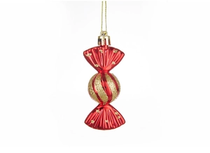 Detailed view of red and gold candy-shaped Christmas tree ornament with glitter and stripes