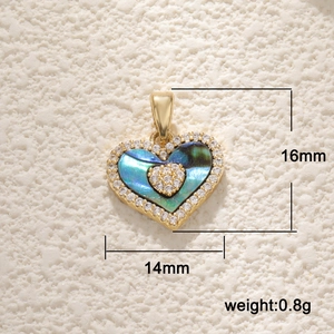 Detail view of heart-shaped abalone shell pendant with dimensions 16mm and weight 0.8g