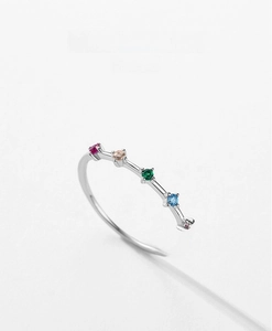 Macro detail of S925 silver ring featuring five colorful prong-set zircon stones