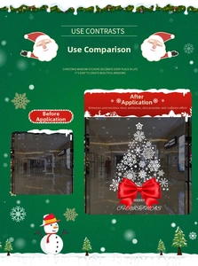 Detail view of Christmas tree window decals with white snowflakes and red bows on glass