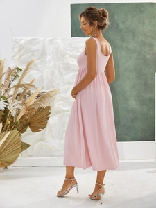 Elegant pink sleeveless ribbed maternity midi dress with high waistline side view