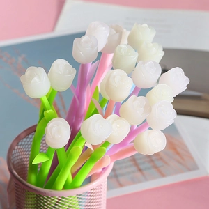 Creative rose flower gel pens with UV color-changing petals in a pink pencil holder