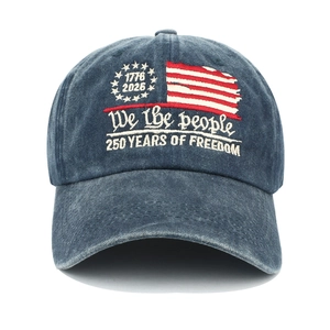 Detail of 250 Years of Freedom 1776-2026 embroidery on navy blue washed denim baseball cap