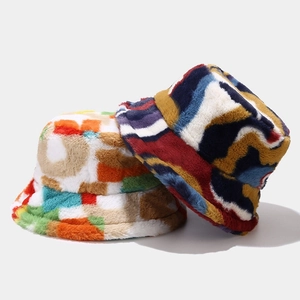 Women's winter plush bucket hat featuring colorful geometric and wave pattern prints