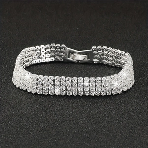 Luxury silver bridal bracelet with four rows of sparkling rhinestones for formal occasions