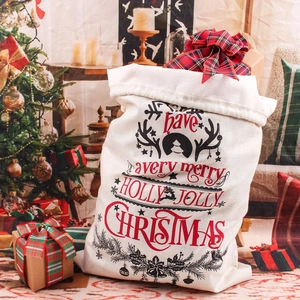 Linen Christmas drawstring gift bag featuring Holly Jolly text and reindeer print