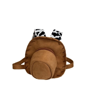 Cartoon cowboy hat backpack in brown suede featuring cow print straps and contrast stitching