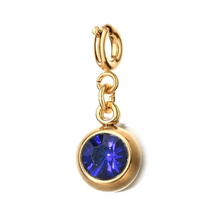 Detailed close-up of 6mm golden stainless steel pendant with round dark blue gemstone