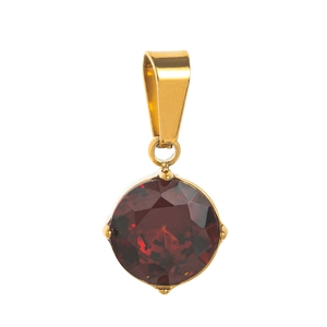 Elegant gold round pendant featuring a deep red zircon gemstone on white background