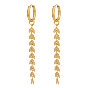 Detailed close-up of gold willow leaf tassel earrings with long leaf pendants