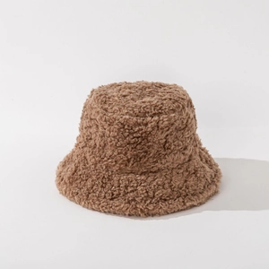 Detailed close-up showing the soft plush texture and thick fabric of the brown bucket hat