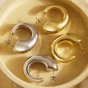 Polished chunky C-shaped hoop earrings in gold and silver finish for women