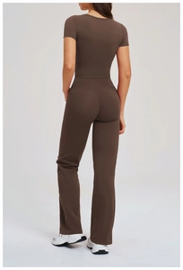 Rear view of deep brown yoga set featuring a slim-fit crop top and high-waisted flared leggings