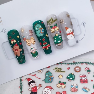3D embossed Christmas nail art stickers with gingerbread man, snowman and tree motifs