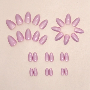 Pale purple cat eye almond press-on nails with shimmering pearlescent finish