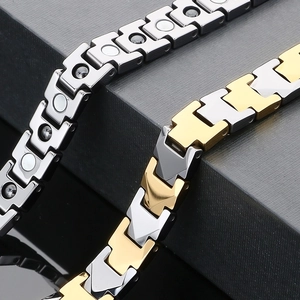 Detailed macro view of polished magnetic therapy bracelets with link structure