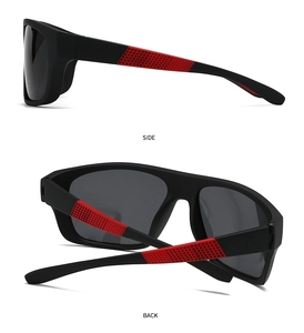 Detail view of polarized sports sunglasses with black frame and red non-slip temple grips