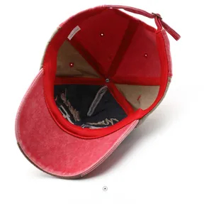 Detailed interior of vintage washed cotton baseball cap with adjustable metal buckle strap