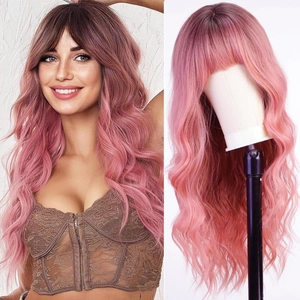 Detail view of pink gradient long wavy wig with bangs on model and mannequin stand