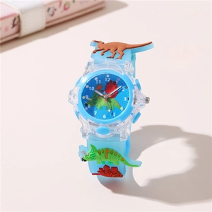 Detail of blue kid's dinosaur watch featuring 3D silicone strap and cartoon dial