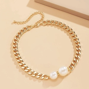 Chunky gold chain necklace with large white pearls and adjustable lobster clasp