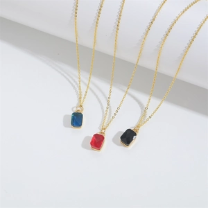 Minimalist gold necklace set featuring square blue, red, and black zircon stone pendants