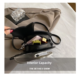 Interior view showing capacity of the black cat-shaped PU leather crossbody bag
